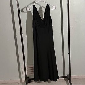 J Crew 100% silk black dress. Size 6. Excellent condition. Classy,timeless,sexy.
